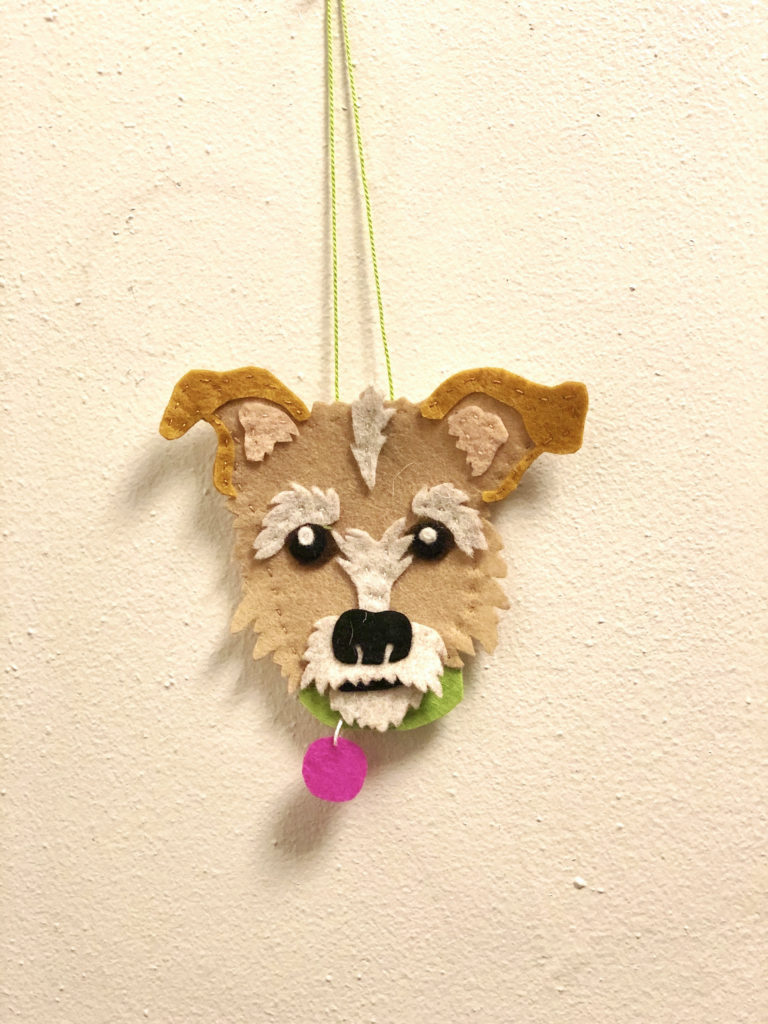 a handmade dog portrait ornament sew with felt