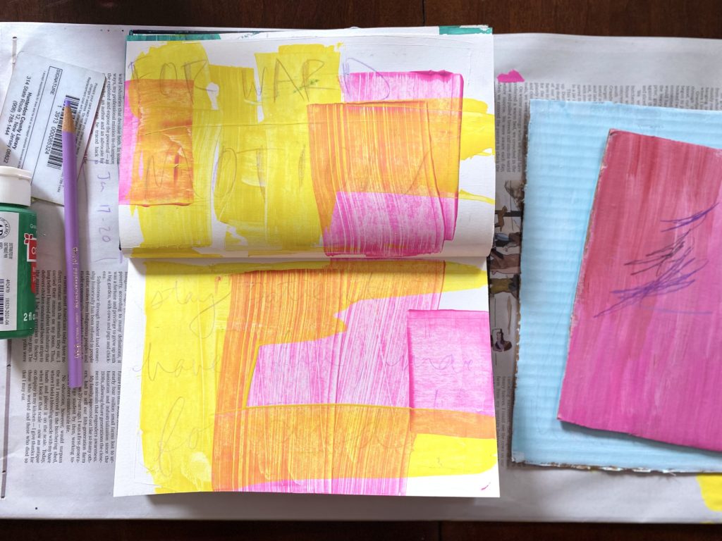 Colorful sketchbook spread by Faith Hale displaying bright pink, yellow, and orange swatches of paint.