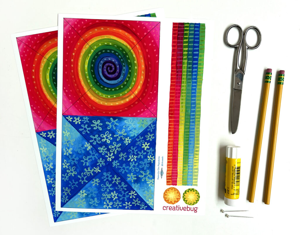 images of supplies needed to make a paper pinwheel: print out of template, scissors, glue stick, two pencils, and straight pins with decorative heads

