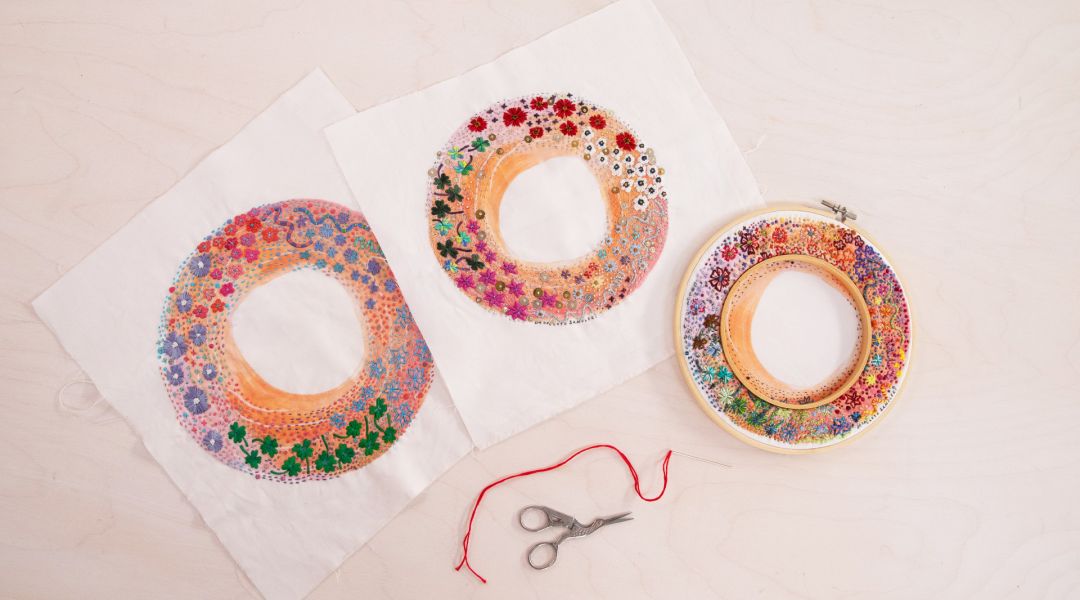 image of an embroidered wreath in a hoop next to similar versions that are out of the hoop